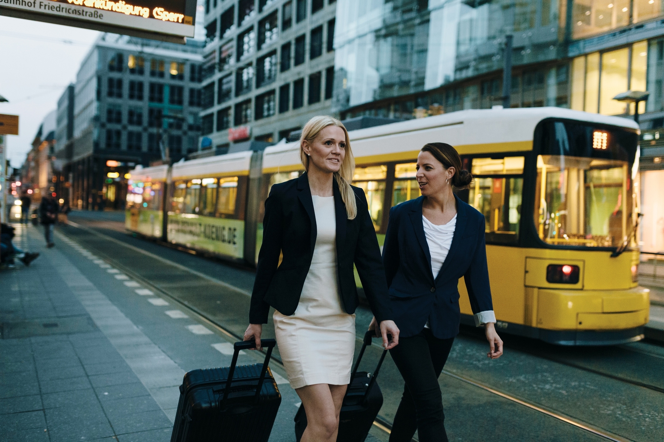 women, walking, travelers, train, train station, baggage